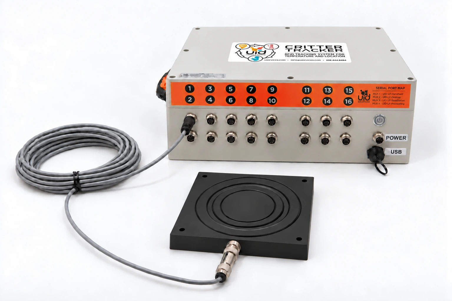 USX-1600 Critter Tracker controller connected to a black square antenna with a coiled cable